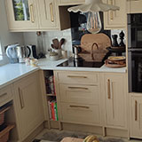 Kitchen cabinets after being resprayed at Somerset property